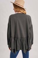 RUFFLED PEPLUM HEM OVERSIZED KNIT TOP