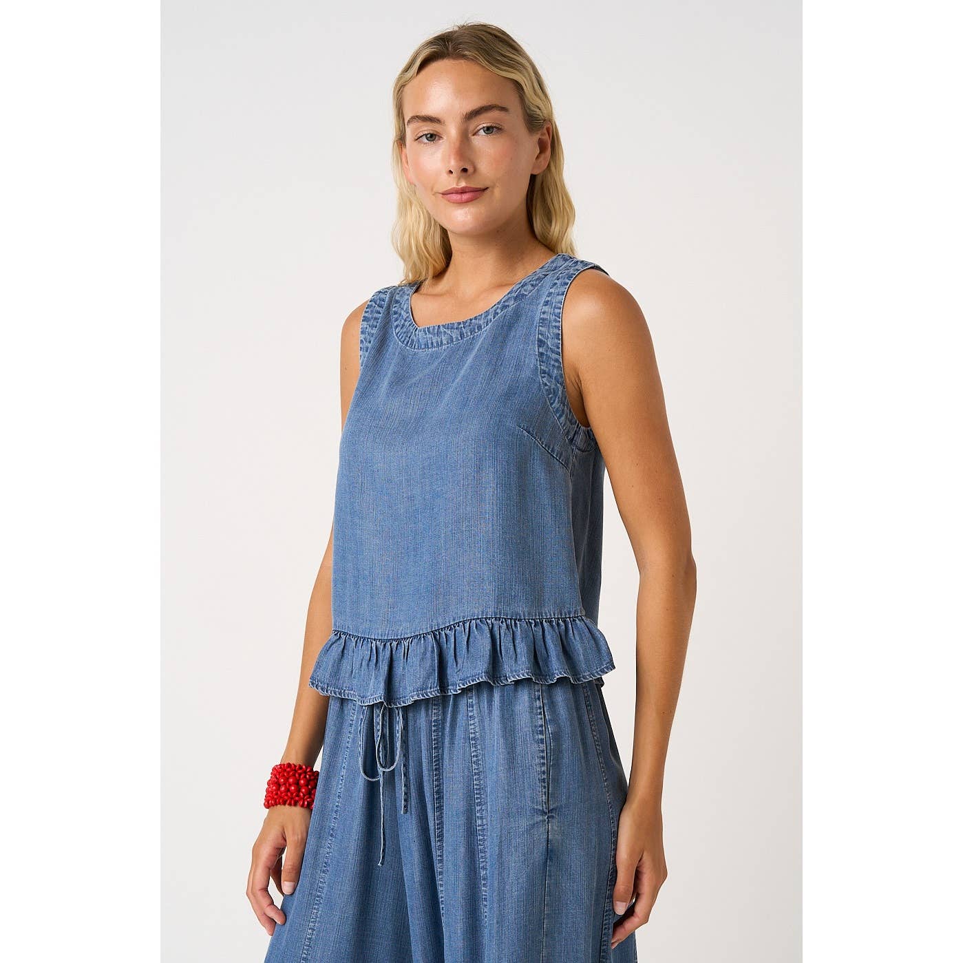 BACK BUTTON DETAIL CHAMBRAY RUFFLE PEPLUM TANK TOP
